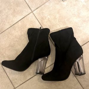 Black booties with clear heel